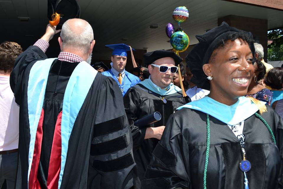 Graduates filing out of commencement